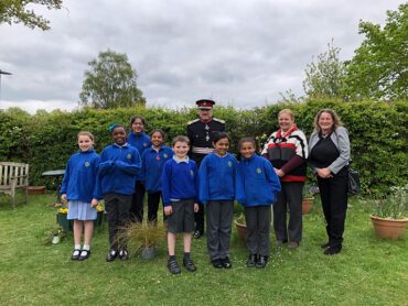 Lord-Lieutenant plants two trees for the QGC at The Ryde School