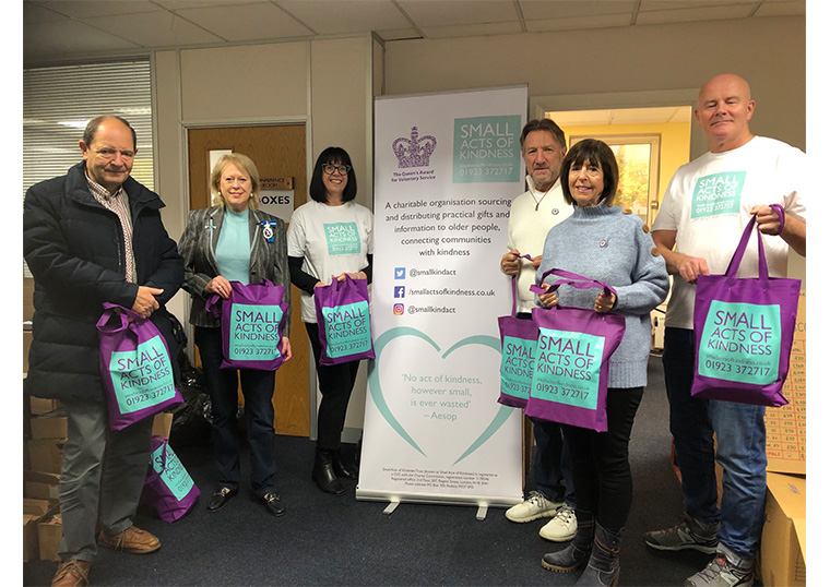 Lord-Lieutenant helping pack Winter Warmer bags for Small Acts of Kindness